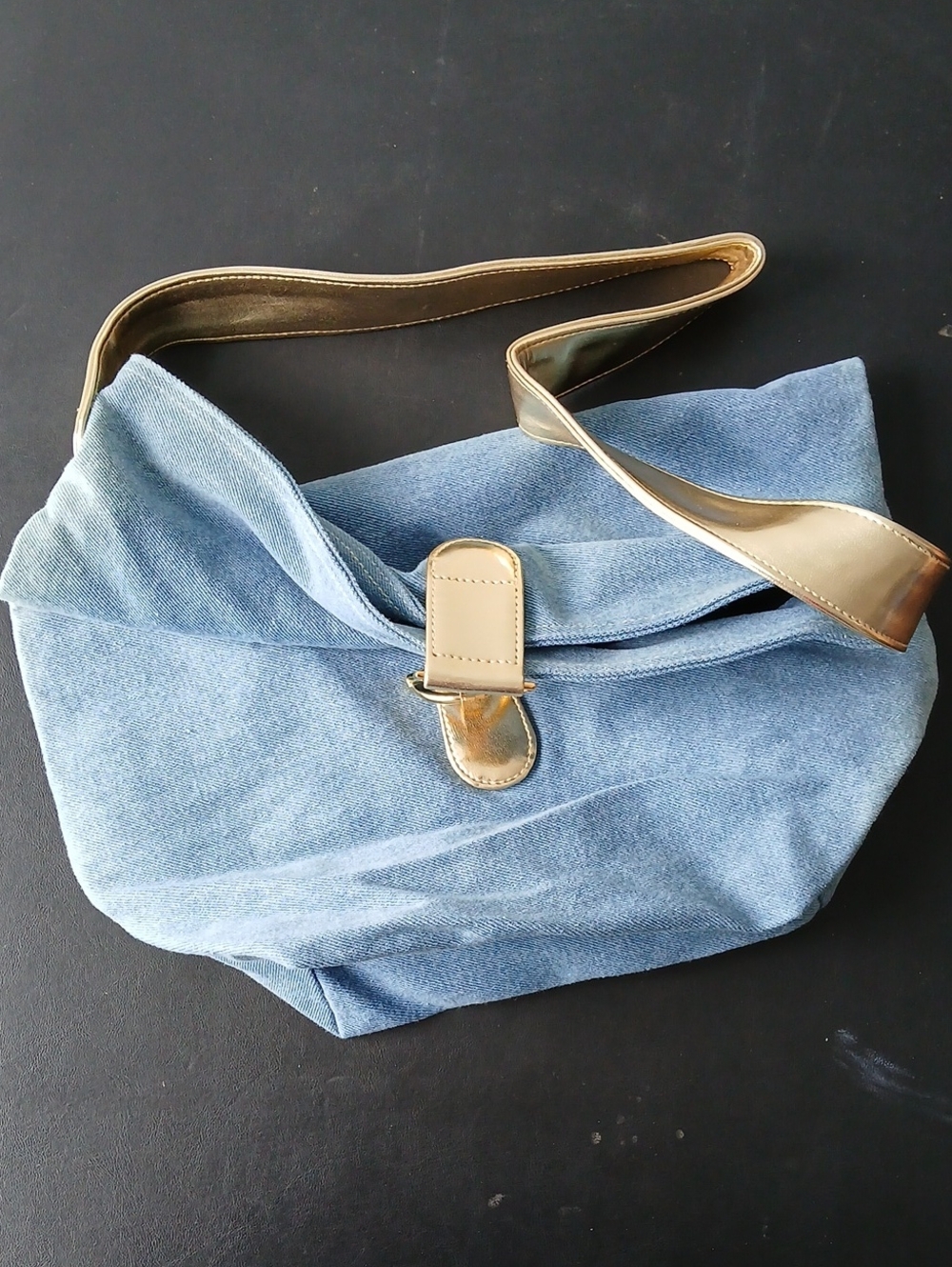 Light Blue Denim Shoulder Bag with Gold Accent Strap